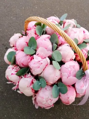 25 peonies in a basket