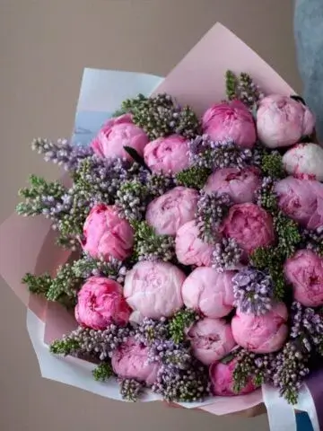 Bouquet of peonies and lilacs