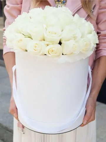35 white roses in a box