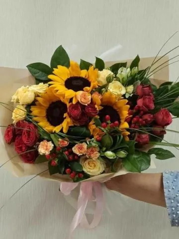 Bouquet with sunflowers and roses